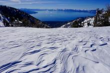 Strong winds from multiple directions over the last few days have stripped snow from terrain constrictions on ridge tops ie “saddles”