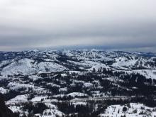 Looking south down the Sierra Crest.  High level cloud cover preventing widespread snow surface softening 