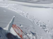 Skier-triggered cracks in a wind-loaded test slope that was undercut.