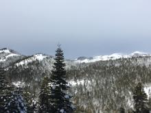 Intense snow transport over the 8000'+ peaks to the North.