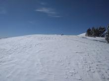 Minor wind scouring and blowing snow on the summit of Deep Creek Peak.