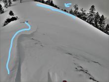 Wind features pointing both directions with cornices in the background.