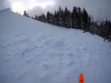 Debris pile an cornice and face that slid