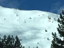Loose wet avalanches occurring yesterday during rapid warming conditions near Hwy 50 below Echo Pass.
