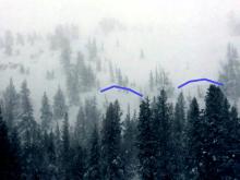 Natural storm slab avalanches on a N aspect at 8700 ft. with ~1 ft crown.