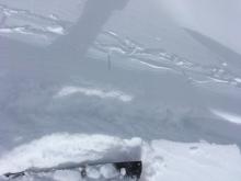 On a north facing test slope, a shallow but 40 foot wide wind slab occurred in response to a ski kick.