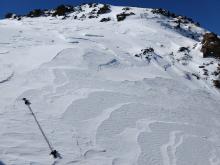 Scoured NE facing slope near the ridgeline