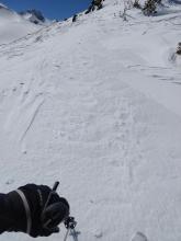 Ice crust exposed by wind scouring on the ridge