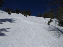 Shallow wet snow over dry snow on SE aspect at 9,600'.