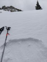 4 inches of wind affected snow near the summit of Rubicon