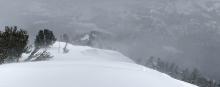 Blowing snow along the summit ridge of Powderhouse.