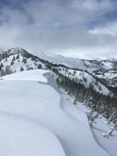 It is tough to safely photograph enormous cornices, but that is what this photo is trying to convey. 