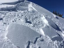Same test slope. My partner noticed this as terrain irregularity with signs of wind effected snow.