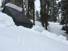 Recent cohesive roof shedding. I skinned right by this on 3/28 and the snow was still on the roof.