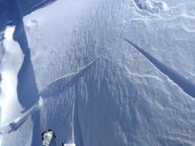 Skier triggered cracking of wind pillow.