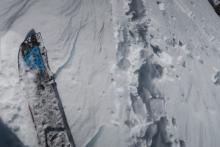 Easy cracking in wind blown snow above skin track.