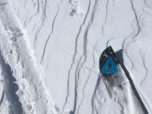 More easy cracking in wind drifted snow above the skin track. 