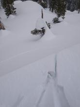 Shooting cracks on test slope prior to the small slab releasing