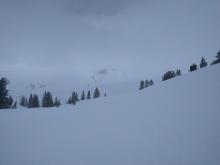 Snow transport over the saddle point between the ridges. The wind direction is ENE