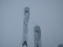 Small cracks in the snowpack near tree line. At this elevation the cracks are only between skis