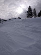 Wind scouring along ridgelines