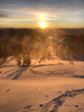 Blowing snow and new wind drifts near summit of Tamarack