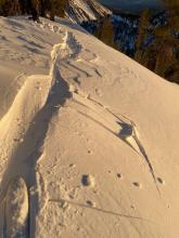 Shooting cracks in obvious wind slab at top of Proletariat