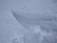 Wind slab cracking in areas that were undercut.  Wind slabs up to 6'' deep.