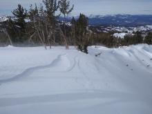 Wind scouring of NE aspect ridgeline.