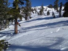 Patchy mix of wind scoured and wind deposits on snow surface on W aspect to the N of Castle Pass.