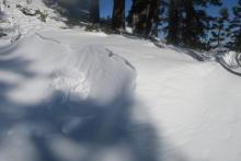 A small natural wind slab on a south facing feature.