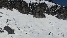 South face of Castle Peak with areas of newer wind-deposited snow.