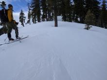 Wind textured snow surfaces on the exposed ridgeline