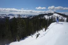 Small ski kick triggered roller balls and pinwheels on a SE facing slope at 8000 ft around noon.