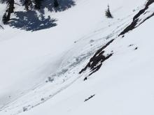 Sluffs of loose wet snow near rocks. 