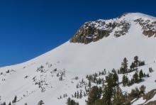 Despite an abundance of previous ski traffic, only a few loose wet slides at mid slope rocky rollover on an East aspect of Stevens.