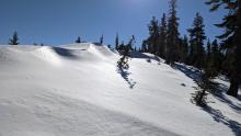 Ridgetop drifts perched above W aspect from previous E winds.