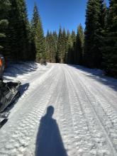 Good snowcover on the roads with loose cold snow for good machine cooling above 7,000'.