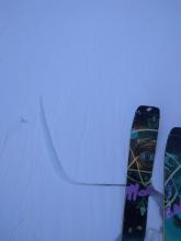 Skier triggered cracking near the edge of the wind slab adjacent to cornice.