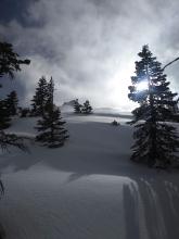 Drifting snow as viewed from near treeline.