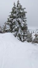 Wind affected snow and drifts along the ridge. 