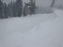 Intentional cornice collapse that entrained snow but did not trigger wind slab propagation. A small amount of slab flank can be seen at the top of the far side.