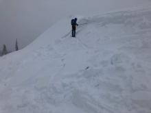 Checking out the soft snow this wind slab failed on.