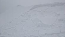 Skier triggered avalanche on a wind-loaded test slope.