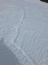 These cracks were about twenty feet back from the edge of cornice