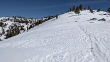 Wind scoured surfaces along the ridge