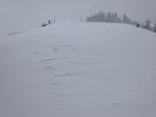 Ridgetop skin tracks nearly fully erased after an hour.