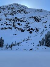 Overview of the slope. There is a helicopter about halfway up the slope on the right side for scale.