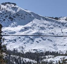 A wind slab avalnache on Donner Peak seen from I80 on 3/21/21