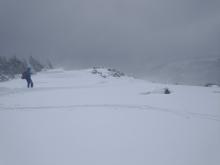 Intense blowing and drifting snow on the ridgetop.